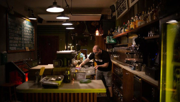 ep archivo   un camarero en el interior de un bar en una calle centrica de barcelona