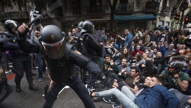 Spanish police during the Barcelona independence referendum spanish police beating protestors barcelona referendum