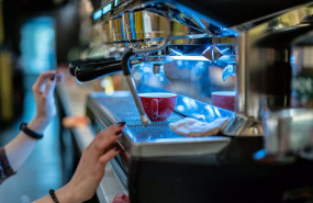 ep archivo   un trabajador prepara un cafe durante una jornada marcada por la reapertura de los