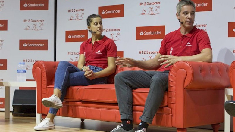 ep carolina marin y su entrenador fernando rivas en un santander talks en la sede del banco en ep carolina marin y su entrenador fernando rivas en un santander talks en la sede del banco en