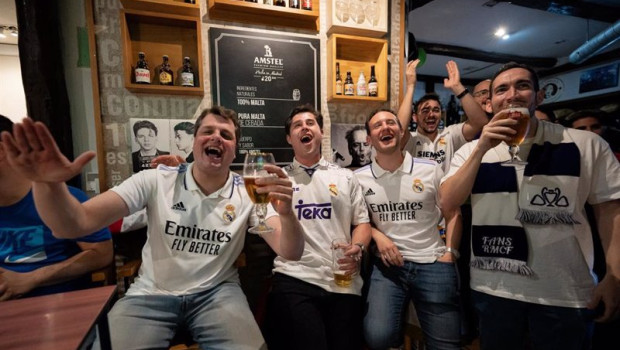 ep archivo   varias personas celebran un gol viendo la emision del partido de ida de semifinales de
