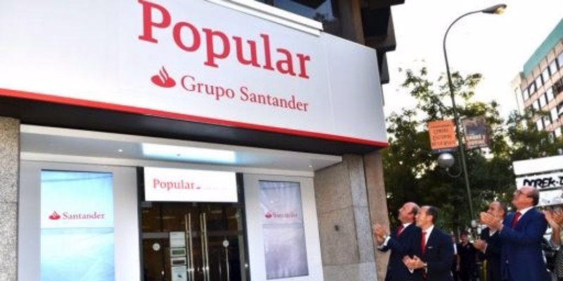 ep oficina de banco popular con el rotulo de grupo santander