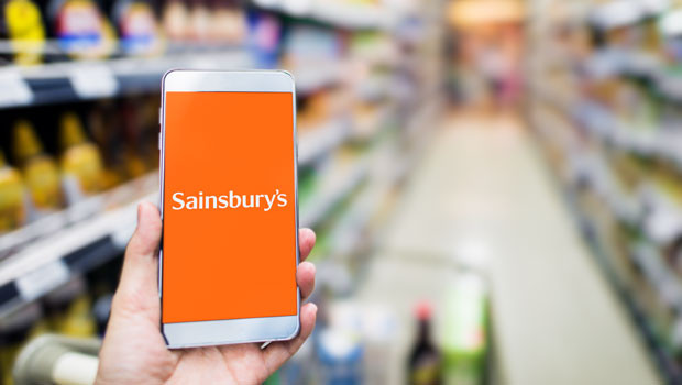 dl sainsburys j sainsbury plc ftse 100 consumer staples personal care drug and grocery stores food retailers and wholesalers logo