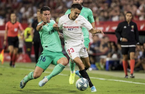 ep 22 september 2019 spain sevilla real madrids james rodriguez l sevillas sergio reguilon battle