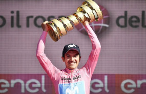 ep 02 june 2019 ecuadorian cyclist richard carapaz of team movistar holds the never ending trophy on