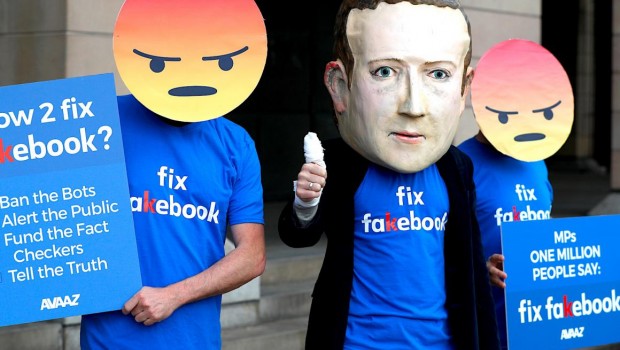 Reuters facebook-protestors-outside-mike-schroepfer-hearing