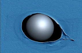 ep imagen de una muestra penetrada por un microproyectil