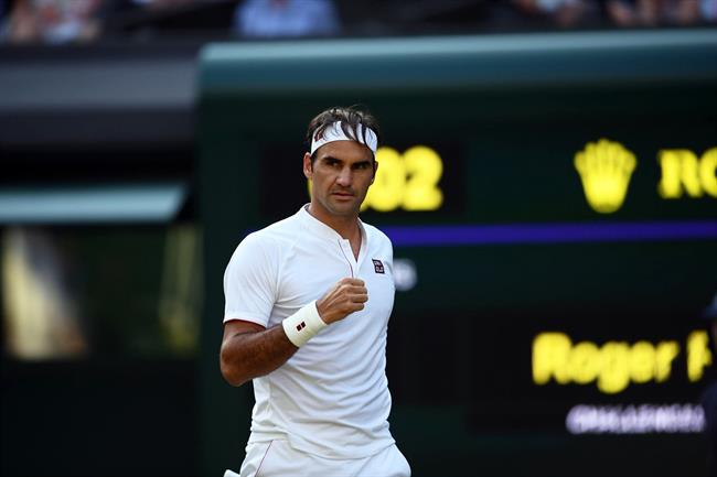 Roger Federer celebra un punto en Wimbledon | AELTC/BEN SOLOMON ep roger federer celebrapuntowimbledon