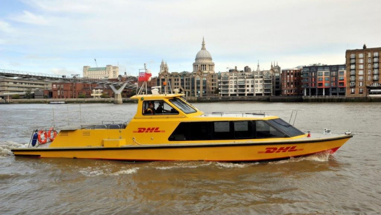 1601538436 dhl express riverboat on river with st pauls