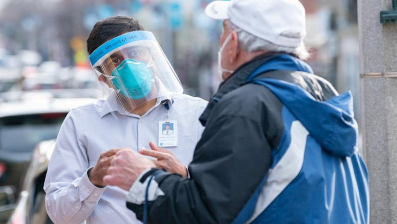 April 14, 2020, Chelsea, Massachusetts,USA: Health researcher conducting rapid blood fingerstick study to measure the prevalence of COVID-19 in Chelase, Massacusetts. The study is sponsored by Partners Health Care, not-for-profit health care system. Chels | Keiko Hiromi ep april 14 2020 chelsea massachusettsusa health researcher conducting rapid blood fingerstick study
