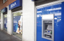 ep archivo   imagen de una oficina y cajero del bbva en madrid con su nuevo logo