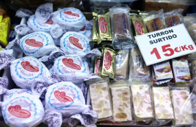 ep archivo   turron y mazapan en un puesto en el mercado de san isidro