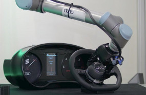 ep imagen de un robot colocando un airbag en un volante de audi